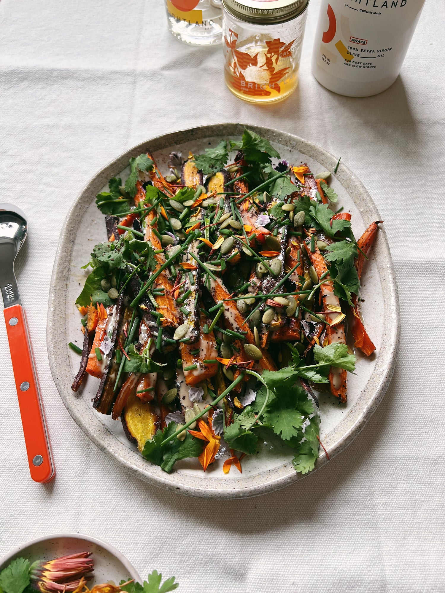 Roasted Carrots with Tahini, Herbs, and Pumpkin Seeds
