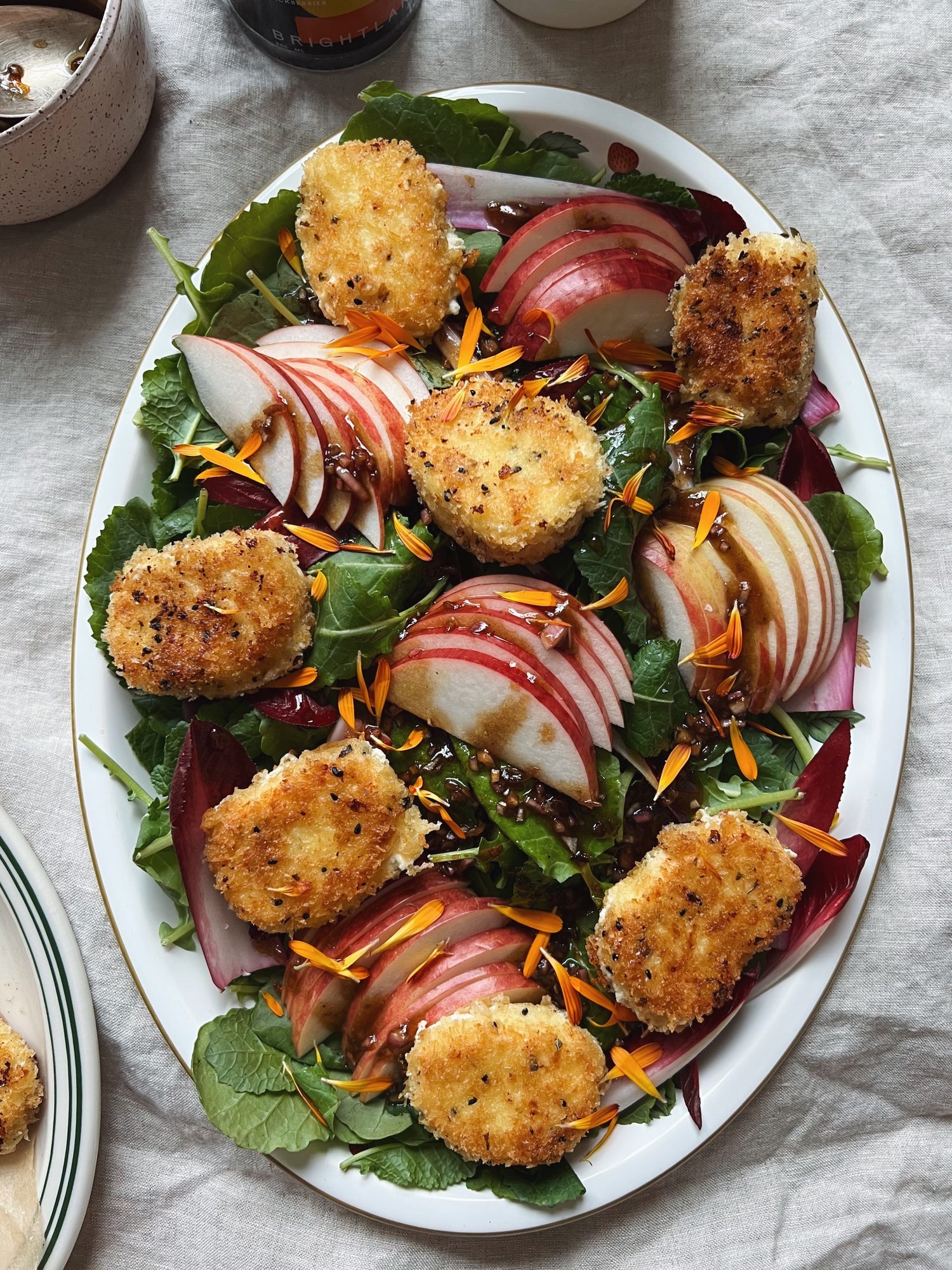 Baby Kale Salad with Fried Goat Cheese & Balsamic Pomegranate Dressing