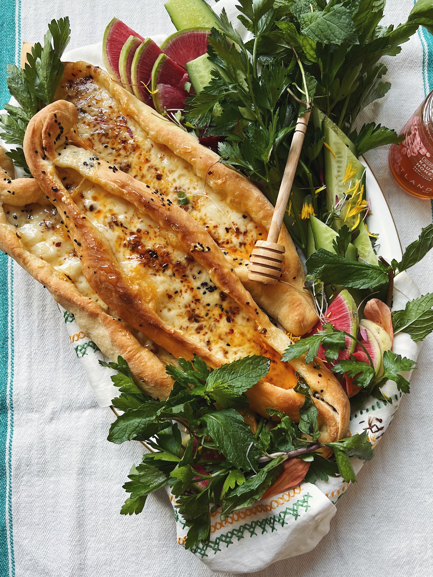 Turkish Cheese Pide with Chili, Honey, and Herbs