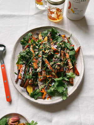 Roasted Carrots with Tahini, Herbs, and Pumpkin Seeds