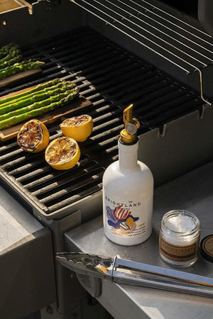 brightland olive oil next to grill